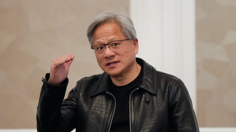 Nvidia CEO and co-founder Jensen Huang attends a media round...