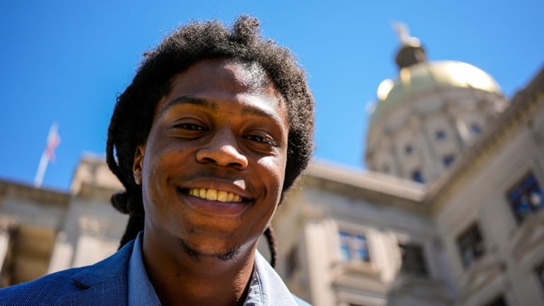 Davante Jennings poses for a photo at the state Capitol,...