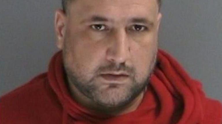 Lyft driver Hussein Saleh, of Farmingville, was charged with two...