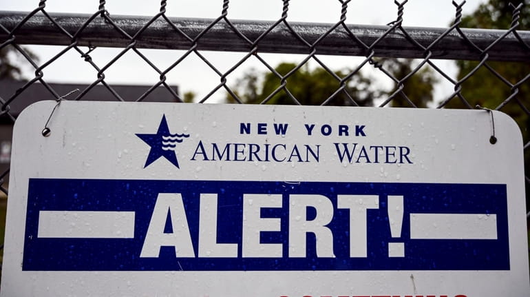 A sign at a New York American Water pump in Rockville...