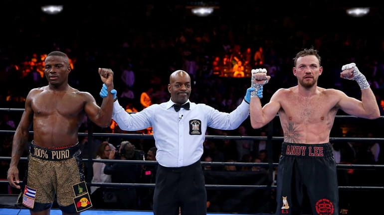 Peter Quillin and Andy Lee stand with the referee as...