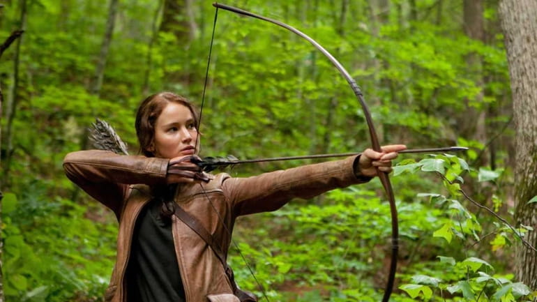 Jennifer Lawrence stars as Katniss Everdeen in "The Hunger Games,"...