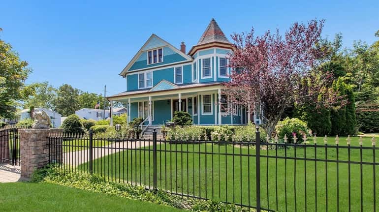 This Patchogue Queen Anne Victorian four-bedroom, 1.5-bathroom home was built...