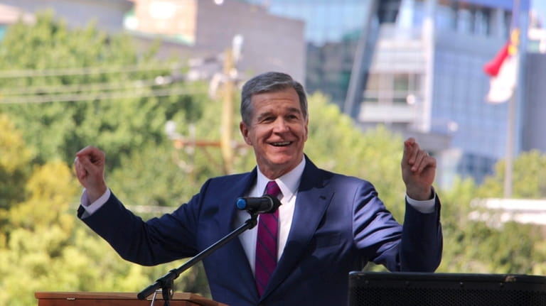 Gov. Roy Cooper speaks at the unveiling ceremony for North...