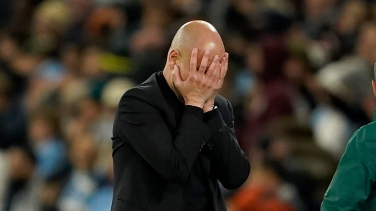 Manchester City's head coach Pep Guardiola reacts during the Champions...