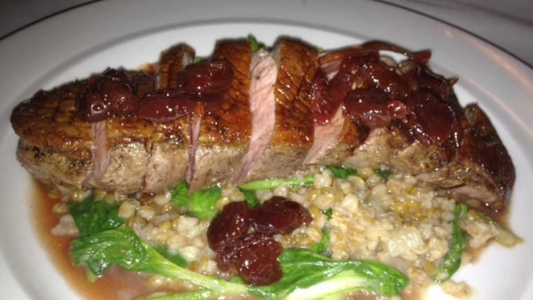 Sauteed duck with farro and cherry agrodolce at Orto restaurant...