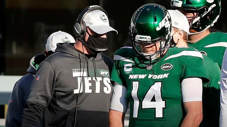 Jets head coach Adam Gase and quarterback Sam Darnold on the...