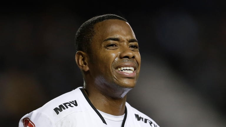 Atletico Mineiro's Robinho reacts after failing to score during a...
