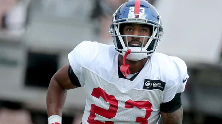 Giants defensive back Logan Ryan participates in a drill during training...