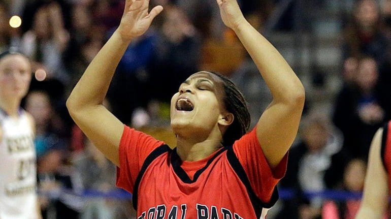 Floral Park's Kaela Hilaire reacts as time expires on March...