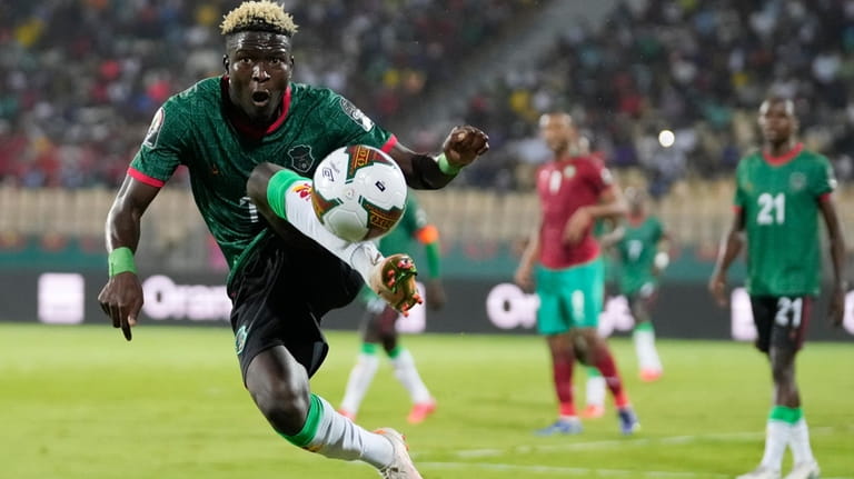 Malawi's Francisco Madinga controls the ball during the African Cup...