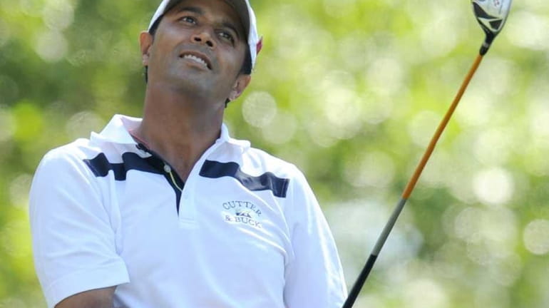 Arjun Atwal of India hits a tee shot during the...