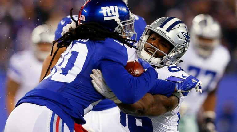 Janoris Jenkins of the Giants intercepts a pass in the...
