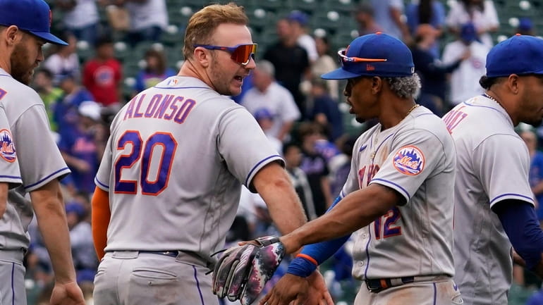 The Mets' Pete Alonso celebrates with Francisco Lindor after the...