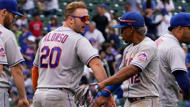 The Mets' Pete Alonso celebrates with Francisco Lindor after the...