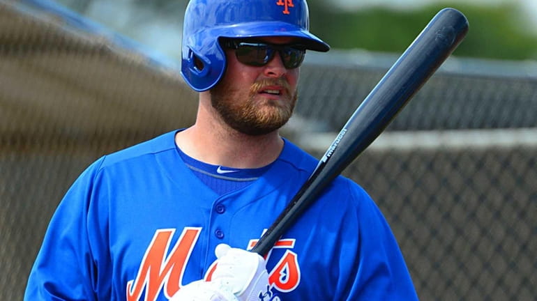 Outfielder Lucas Duda gets ready for batting practice at spring...