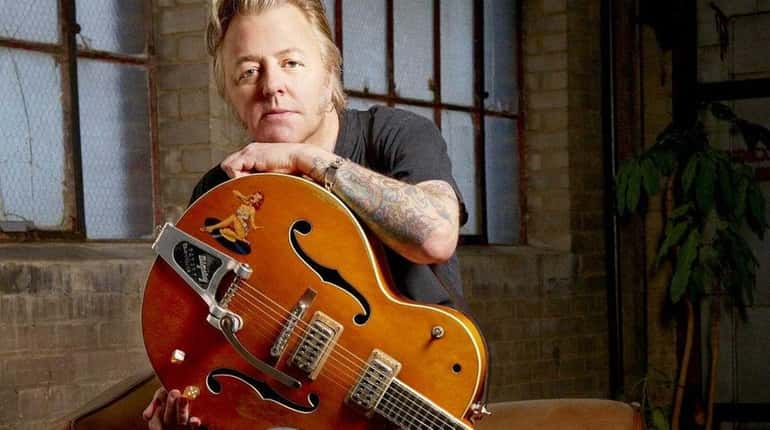 Brian Setzer sang this year to "The Girl With the...