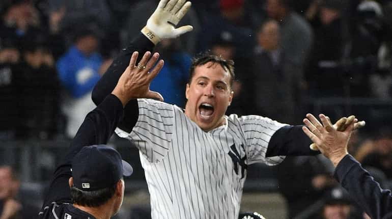 New York Yankees first baseman Mark Teixeira celebrates after his...