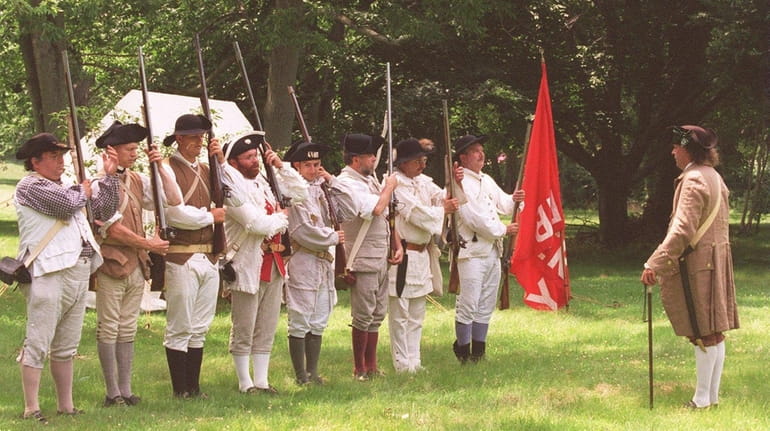 Members of the Ancient and Honorable Huntington Militia, bearing arms...
