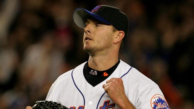 Mets' Billy Wagner pumps his fist after getting the final...