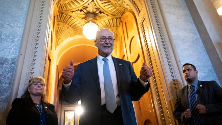 Senate Majority Leader Chuck Schumer (D-N.Y.) gives the thumbs up...