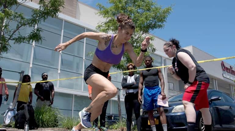 Brooklyn resident Emily Rosario competes at the 24 Hour Fitness...