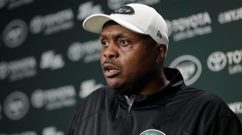 Jets defensive coordinator Kacy Rodgers talks to reporters at the...