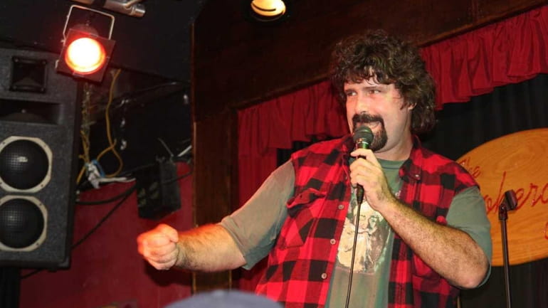 Setauket native and WWE Superstar Mick Foley performs his stand-up...