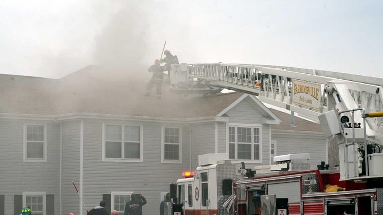 Emergency personnel respond to a fire at a apartment complex...
