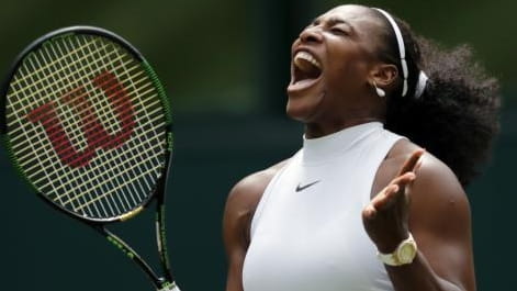Serena Williams of the U.S celebrates a point against Amara...