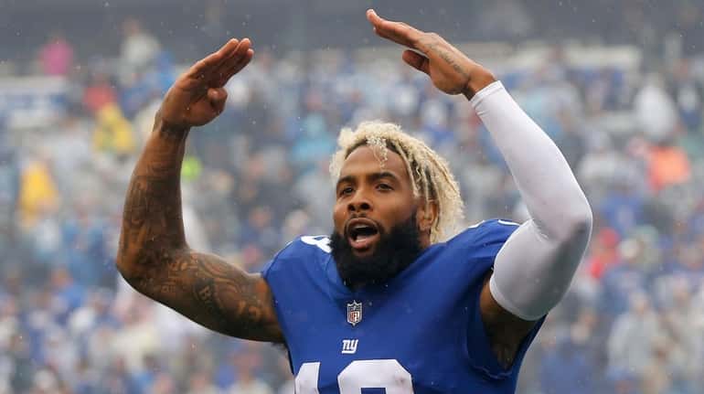 Odell Beckham of the New York Giants fires up the...