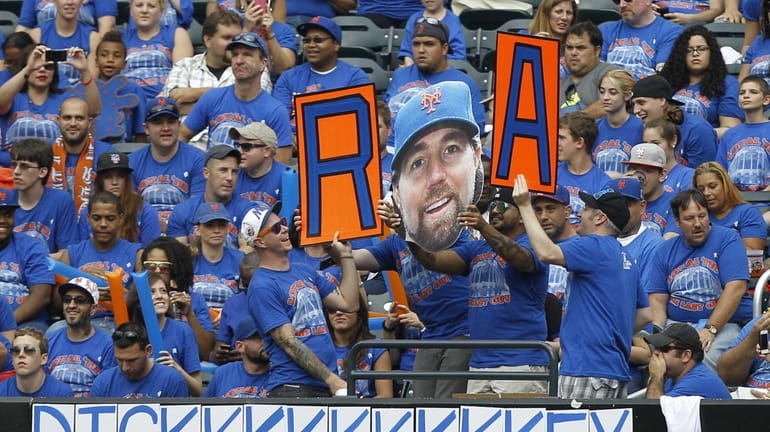 Fans pay tribute to New York Mets pitcher R.A Dickey,...