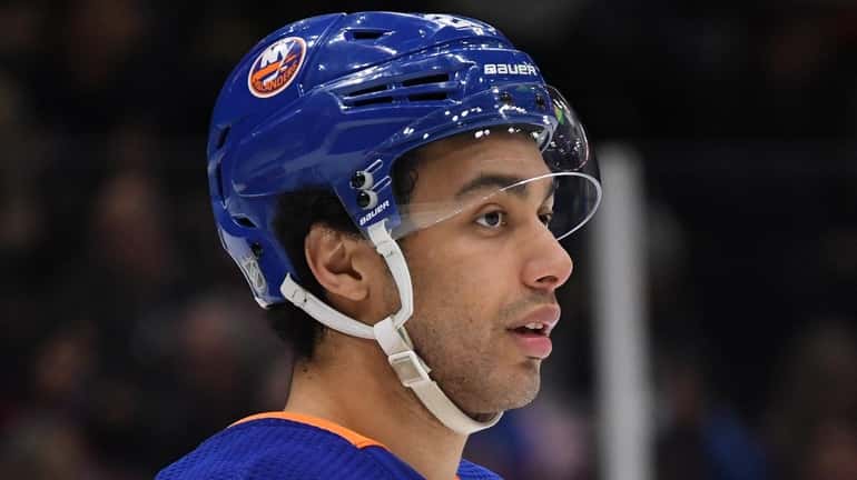 Islanders right wing Josh Ho-Sang looks on against the Detroit...