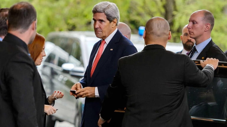 Secretary of State John Kerry arrives in Geneva, on the...