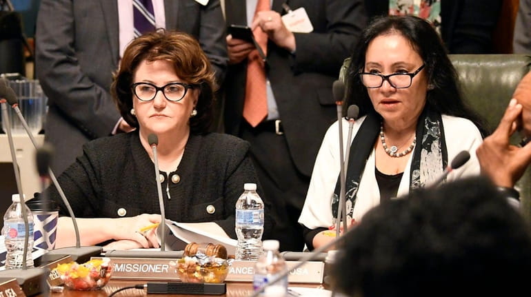 State Education Commissioner MaryEllen Elia, left, and Board of Regents...