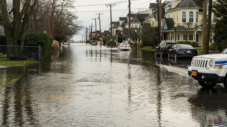 Flooding at the intersection of South Ocean Avenue and Harrison Street in...