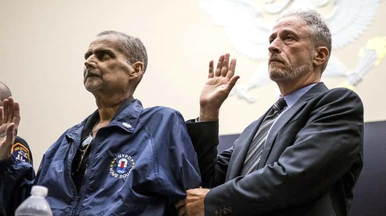 Retired NYPD Det. Luis Alvarez, a 9/11 responder, with former...