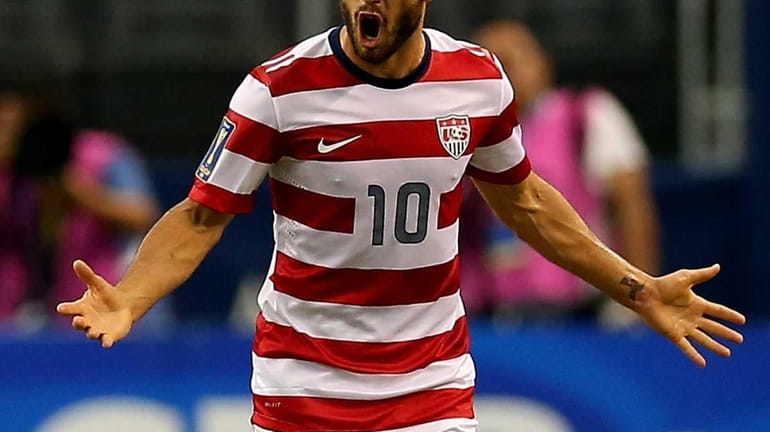 The United States' Landon Donovan celebrates his goal against Honduras...