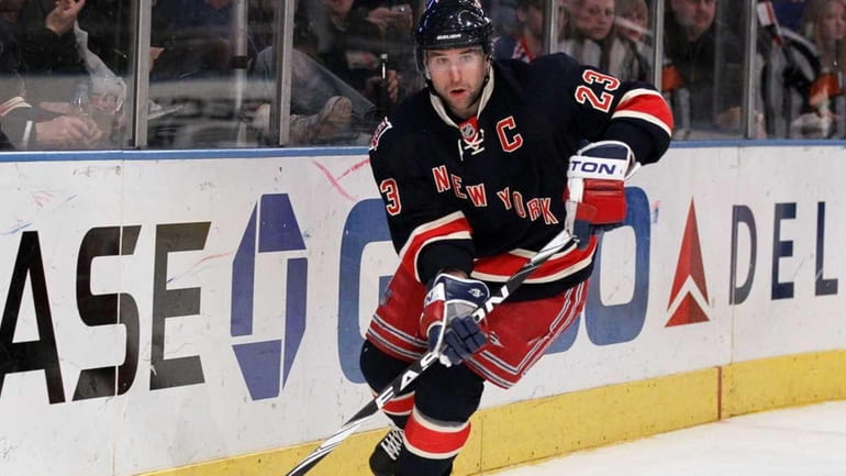 Chris Drury #23 of the New York Rangers skates against...