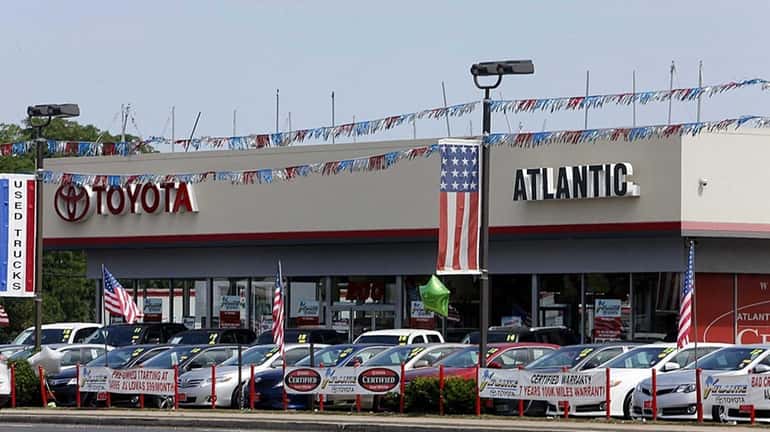This is an Atlantic Toyota dealership on Sunrise Highway in...