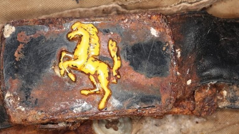 A belt buckle found with the human remains discovered in March...