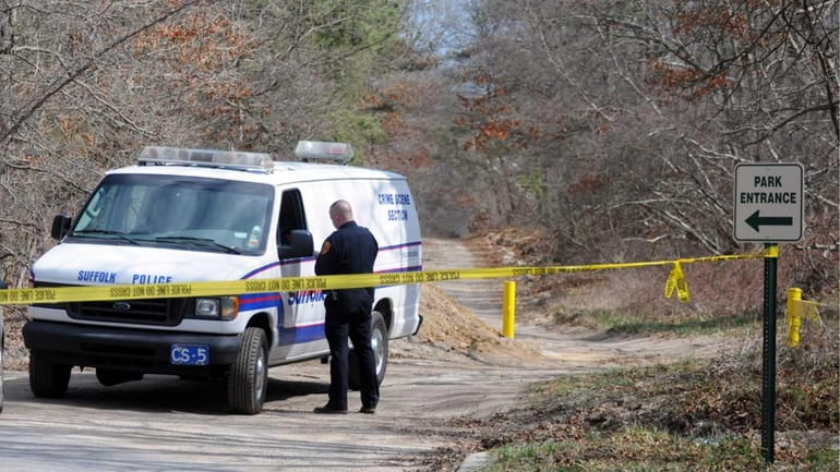 Suffolk police investigate the scene at Manorville Hills County Park...