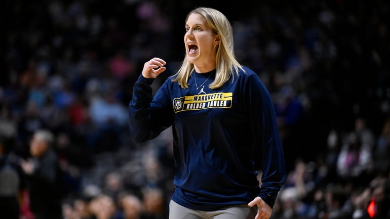 Marquette head coach Megan Duffy calls to her team during...