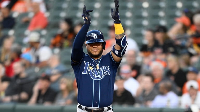 Tampa Bay Rays' Harold Ramirez gestures after he singled during...