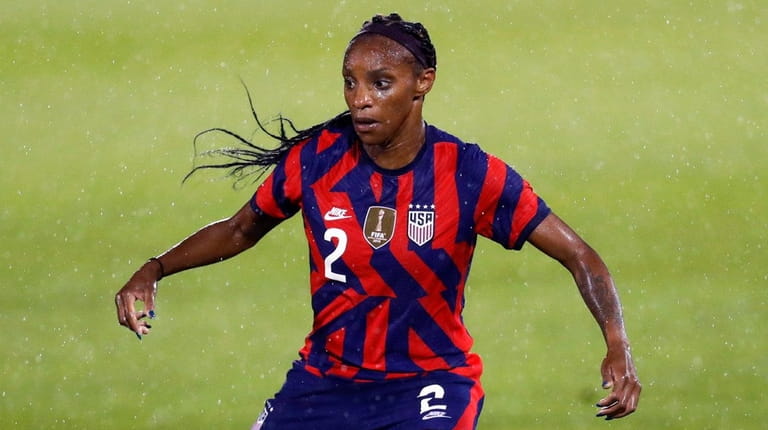 Crystal Dunn of the United States dribbles downfield during the...