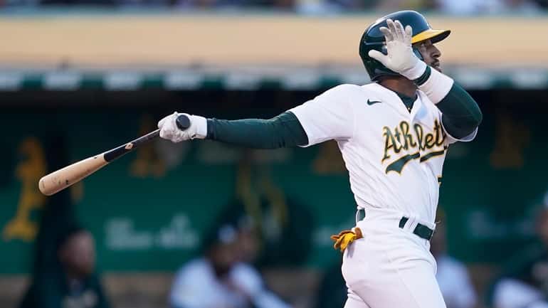 Oakland Athletics' Tony Kemp watches his two-run double against the...