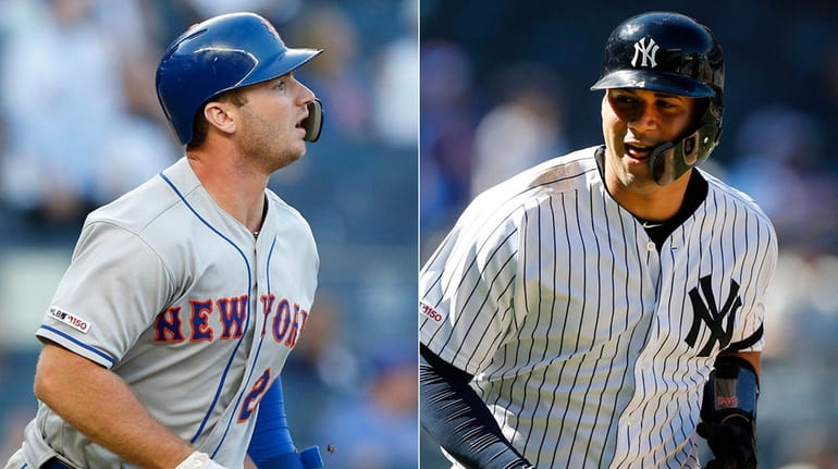 Mets first baseman Pete Alonso, left, and Yankees catcher Gary...