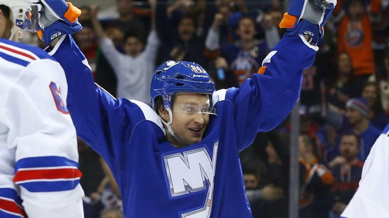 Mikhail Grabovski of the New York Islanders celebrates his first...