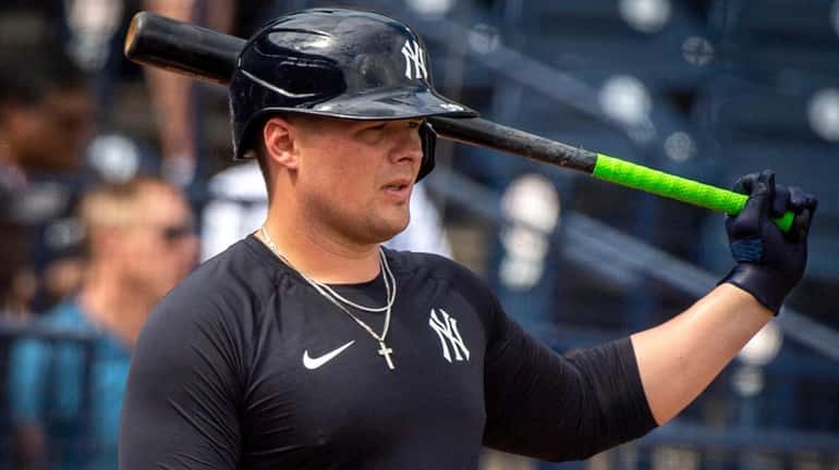 The Yankees' Luke Voit looks on during batting practice at...