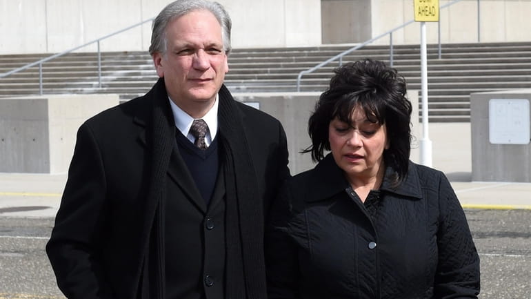 Ed and Linda Mangano outside federal court in Central Islip...